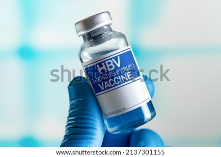 Vaccination for booster shot for HBV against Hepatitis B Virus in the babies. Doctor with vial of the doses vaccine for HBV against Hepatitis B Virus disease. Vaccination and health care concept Royalty-Free Stock Photo #2137301155