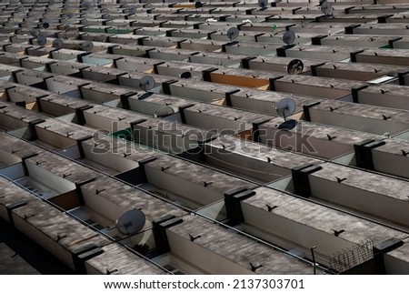 Abstract architecture. Concrete building block. Huge communist style construction for the masses. Royalty-Free Stock Photo #2137303701