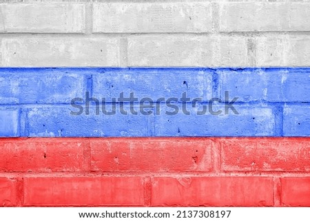 Russia flag painted on old brick wall texture background, white blue red