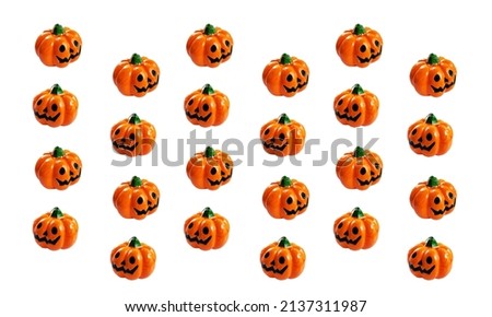 Seamless pattern of Halloween orange pumpkin decoration closeup isolated on white background