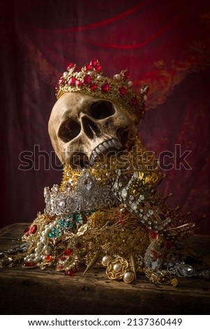 Romantic image of a treasure chest filled with jewellery, precious gems and golden king's crowns Royalty-Free Stock Photo #2137360449