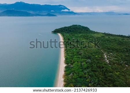 Beach, mountains and cloudy sky in Florianopolis, Brazil. Aerial view