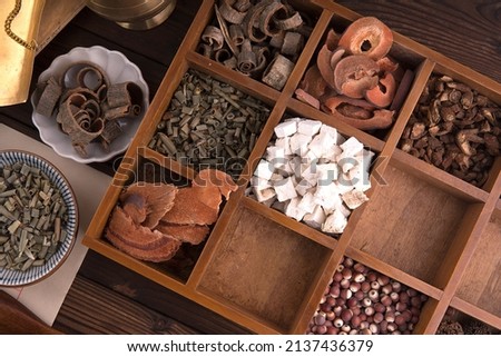 All kinds of Chinese medicinal materials in the classification medicine box Royalty-Free Stock Photo #2137436379