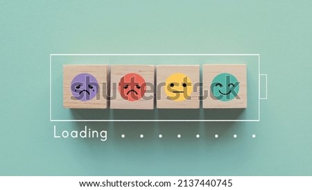 
Emotion wooden blocks in loading bar ,mental health assessment, child wellness,world mental health day, think positive, boost energy level concept Royalty-Free Stock Photo #2137440745