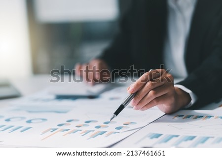 Business analyst checking in financial statement for audit internal control system. Accounting and Financial Concept. Royalty-Free Stock Photo #2137461651