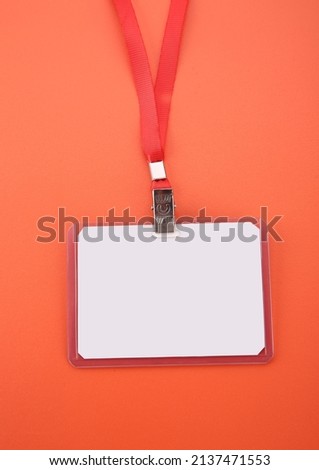 Work ID name tag. The ID of the employee. Card icons with ropes on a red background