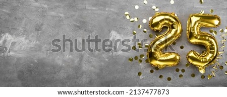 Yellow foil balloon number, number twenty-five on a concrete background. 25th birthday card. Anniversary concept. for anniversary, birthday, new year celebration. banner, copy space. Royalty-Free Stock Photo #2137477873