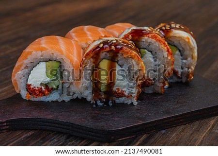 Asian traditional snack. Preparing healthy snack. Japanese sushi - fast food. 
