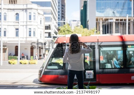 View of a young girl in the city