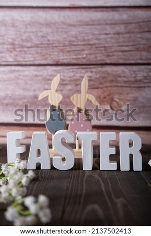 Three-dimensional inscription in plaster letters Easter with decor