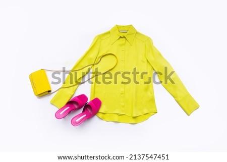 long sleeves yellow casual shirt closeup with handbag, shoes on white background 