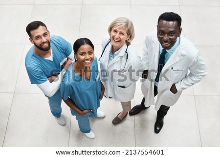 Working together as a coordinated and committed multidisciplinary team. Portrait of a group of medical practitioners standing together in a hospital.