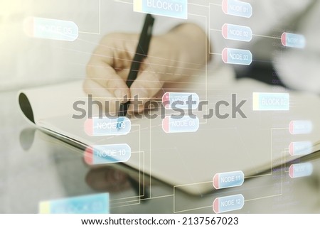Multi exposure of abstract creative coding sketch and man hand writing in notebook on background, artificial intelligence and neural networks concept