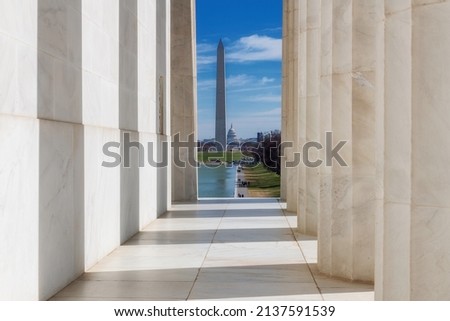 View of the Washington Monument through the columns of the Lincoln Memorial, Washington, DC