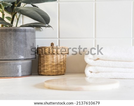 Marble white round podium for bathing products in bathroom, spa shampoo, shower gel, liquid soap. Place, background for cosmetics. Front view. Copy space Royalty-Free Stock Photo #2137610679