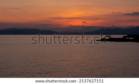 Gorgeous orange colours on the sky during sunset on the island of Langkawi, Kedah in Malaysia.