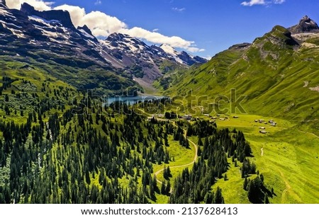 Beautiful mountain green valley landscape. Mountain green valley panorama. Village in mountain valley Royalty-Free Stock Photo #2137628413