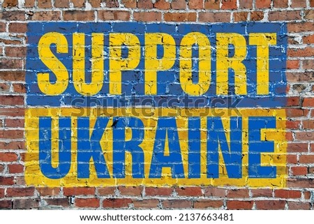 a brick wall support ukraine flag painted war protest russia troops united pride symbol national ukrainian fight ukrainians russian protection unite painting