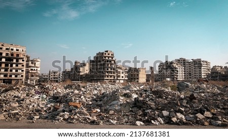City in Syria destroyed by war  Royalty-Free Stock Photo #2137681381