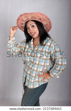 not focus : Beautiful Indonesian woman wearing hat like cowgirl