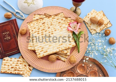 Pesah celebration concept (jewish Passove holiday). Traditional pesakh text in hebrew: Passover tale, egg, bone, maror
