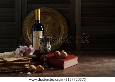 Passover celebration with wine and matzo . Pesach background (Jewish Passover holiday) Royalty-Free Stock Photo #2137720373