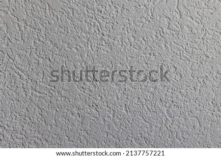High quality texture of a textured interior wall painted matte white. High quality photo