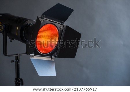 Light for a photo studio. Red light lamp