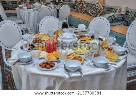 Ramadan in Morocco. Iftar food in Ramadan. Harira soup. Moroccan bread juices. And cheese. islamic food Royalty-Free Stock Photo #2137780581