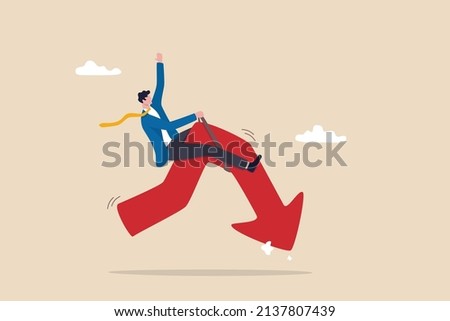 Stock market or crypto currency crash and going down, economic crisis or investing risk, volatility and fluctuation concept, businessman investor rodeo riding uncertainty decline red arrow graph. Royalty-Free Stock Photo #2137807439