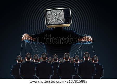 Television zombifies people through propaganda. The puppeteer holds the puppets. Manipulating the crowd with the help of fakes, false information Royalty-Free Stock Photo #2137815885