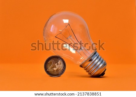 light buld with euro money coin