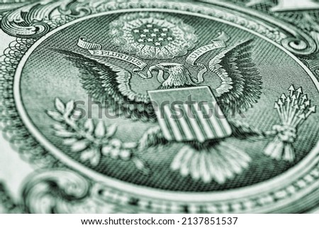 US dollar. Fragment of banknote. Reverse of bill with the Great Seal. The bald eagle is the national symbol. Green tinted illustration. American treasury and treasuries. Economy of the USA Royalty-Free Stock Photo #2137851537