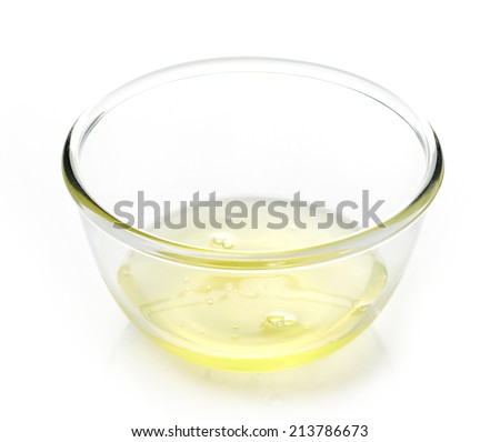 eggs whites in a glass bowl isolated on white Royalty-Free Stock Photo #213786673
