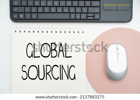 Inspiration showing sign Global Sourcing. Word Written on practice of sourcing from the global market for goods Office Supplies Over Desk With Keyboard And Glasses And Coffee Cup For Working