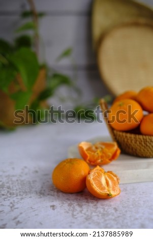 tangerines and peeled tangerine on a white background .Selective focus. 

