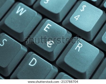 Detail of keys on a computer keyboard - cool cyanotype