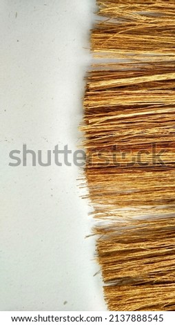 Brown pattern of injuk broom strands from rice stalks to clean dust