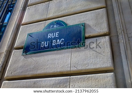 famous typical street name plate and sign of Paris , france