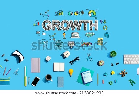 Growth with collection of electronic gadgets and office supplies