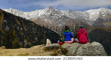 People Enjoying the View at Triund, Laka, Indrahar Pass Trail, Dauladhar Range, Himachal Pradesh, India Royalty-Free Stock Photo #2138041465