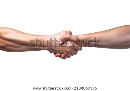 Friendly handshake, friends greeting, teamwork, friendship. Close-up. Rescue, helping gesture or hands. Strong hold. Two hands, helping hand of a friend. Handshake, arms friendship. Royalty-Free Stock Photo #2138069395