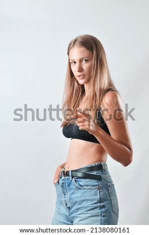 Young woman wearing panties and crop top at home - stock photo 105272