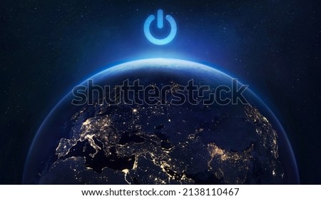 Earth hour. Turn off the light for save planet. Blackout. Earth sphere at night with cities lights. Elements of this image furnished by NASA Royalty-Free Stock Photo #2138110467