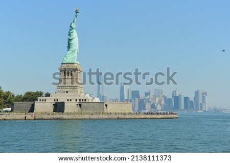 Image taken from a ferry arriving at Liberty Island. The image shows the Statue of Liberty with Manhattan in the background.