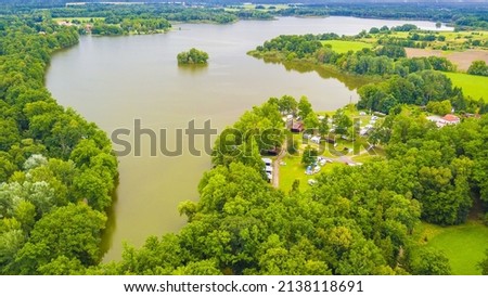 Aerial view of Opatovicky pond with campsite near Trebon, South Bohemia, Czech republic, European union. Famous carp breeding lakes and tourist destination with many landmarks.