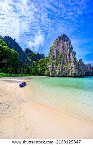 Hidden beach in Matinloc Island, El Nido, Palawan, Philippines - Paradise lagoon and beach in tropical scenery Royalty-Free Stock Photo #2138125847