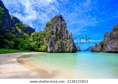 Hidden beach in Matinloc Island, El Nido, Palawan, Philippines - Tour C route - Paradise lagoon and beach in tropical scenery Royalty-Free Stock Photo #2138125853