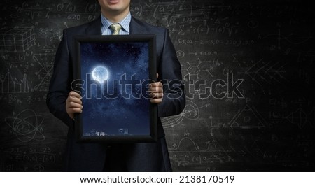 Full moon on night sky. Elements of this image furnished by NASA . Mixed media