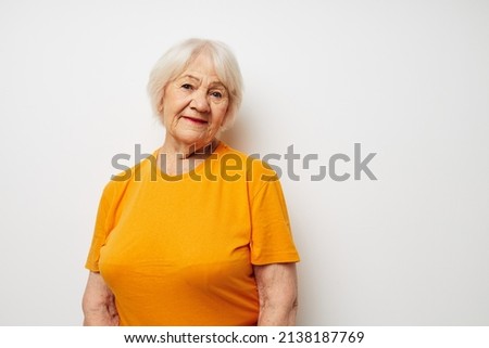Photo of retired old lady holding a glass of water health close-up emotions